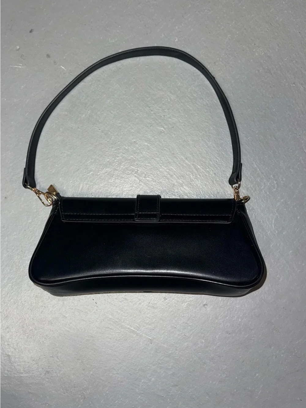 Sleek Black Leather Shoulder Bag with Gold Hardware